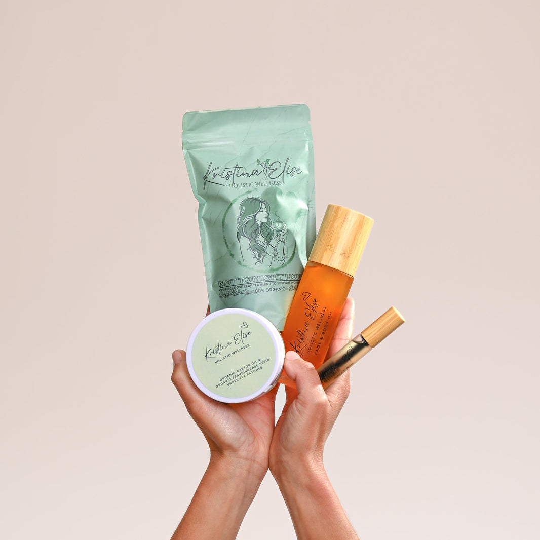 Hands holding skincare products with a beige background